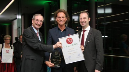 Christoph Leits, Mario Pulker und Christian Burkia bei der Preisübergabe