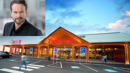 Thomas Wollner und ein Rosenberger Restaurant von außen