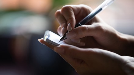 Eine Gästeliste im Restaurant