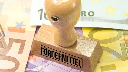 Stempel mit der Aufschrift Fördermittel