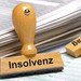 Zwei Stempel mit Aufdrucken "Insolvenz" und "Antrag"
