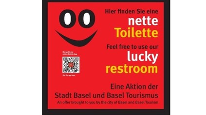 Ein Aufkleber auf dem Hier finden Sie eine nette Toilette eine Aktion der Stadt Basel und Basel Tourismus steht