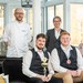 Küchendirektor Christian Braun, Schulungs- und Ausbildungskoordinatorin Cornelia Frick, Azubi Patrick Decker und Azubi Magnus Martius