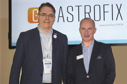 Markus Zoglauer und Kay Taubert vor dem Gastrofix Logo