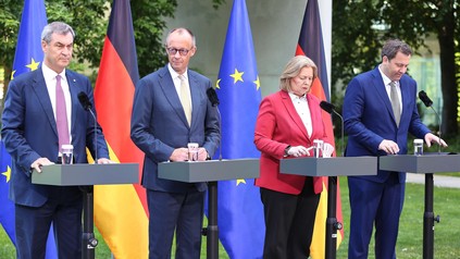Bayerns Ministerpräsident Markus Söder (CSU), Bundeskanzler Friedrich Merz (CDU), Bundesministerin für Arbeit und Soziales Bärbel Bas (SPD), Bundesminister der Finanzen Lars Klingbeil (SPD)