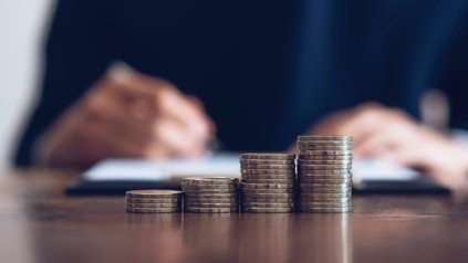 Coin to stack money, financial Business Growth. Men