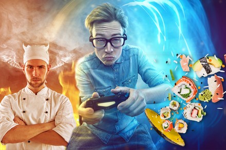 Zwei Köche, die sich mit einem Computerspiel unterhalten