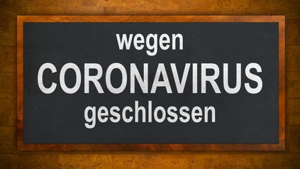 Schild „Wegen Coronavirus geschlossen“