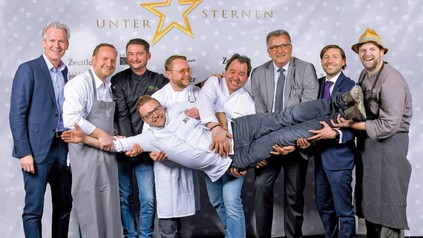 Gruppenfoto der Köche und Sponsoren
