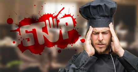 Koch mit Kopfschmerzen