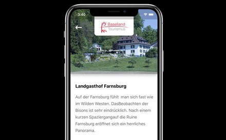 Ein Smartphone auf dem die Seite des Baselland Tourismus geöffnet ist