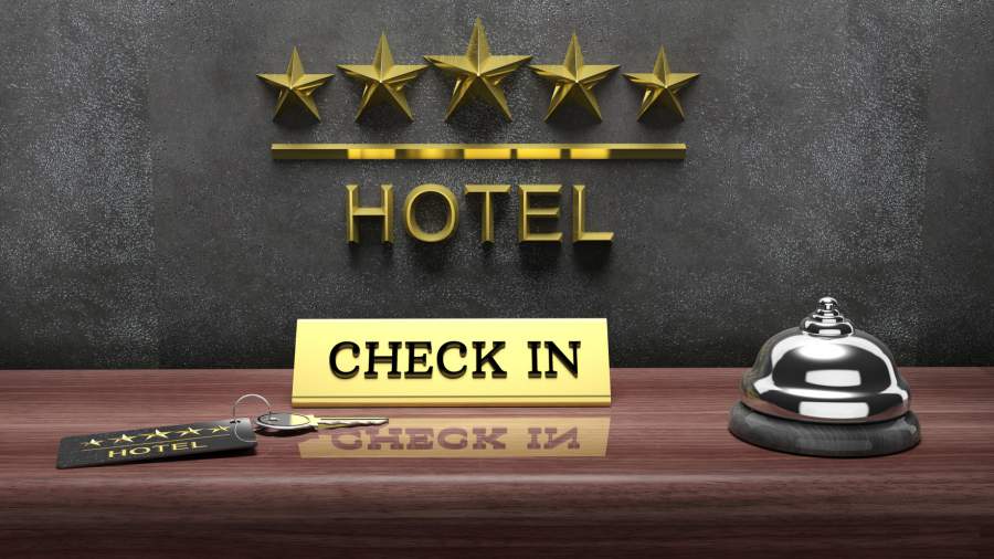 Hotel Rezeption mit Serviceklingel und Schlüssel